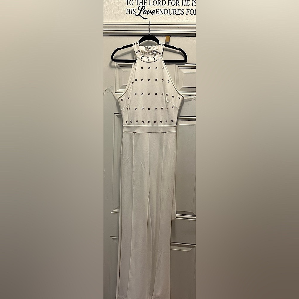 Creamy white sexy Semetric gold bedded from waist up jumpsuit with belt.
